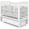 Кроватка Indigo Vista 120*60 с маятником на колесах белая аляска